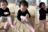 Bé gái 2 tuổi gây xúc động vì khoảnh khắc tự đeo chân giả